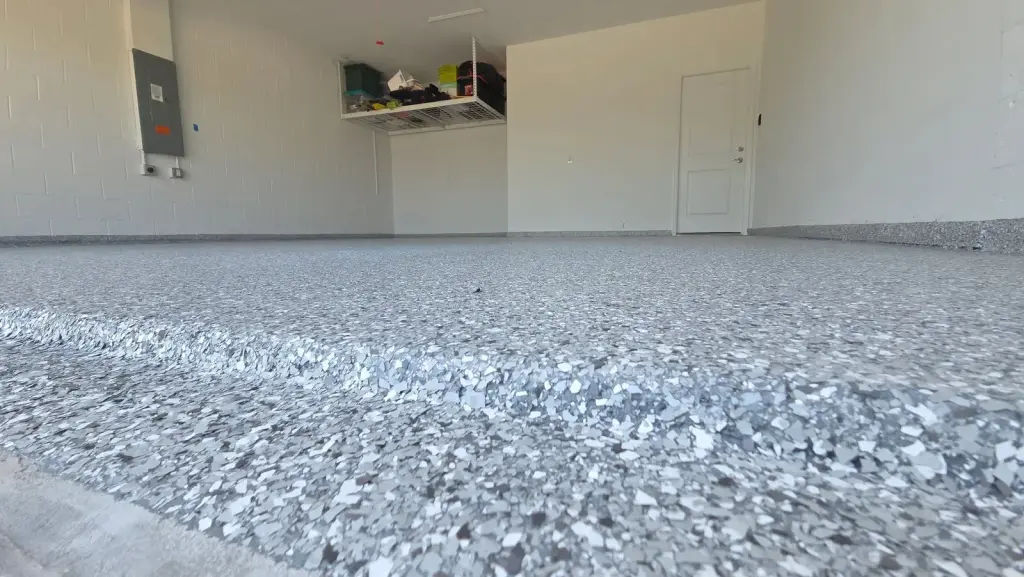 Detailed view of a gray epoxy garage floor finish