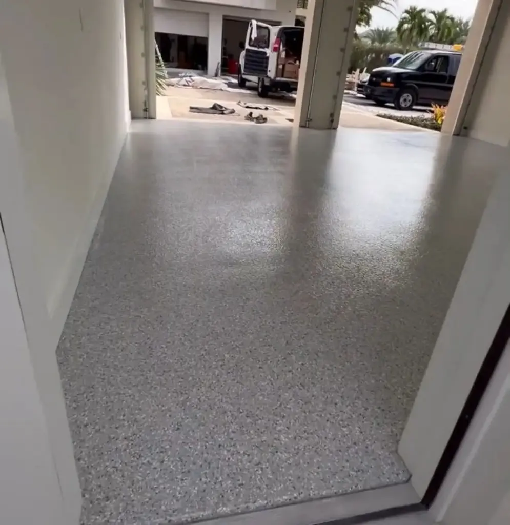View of a newly finished gray epoxy floor from doorway