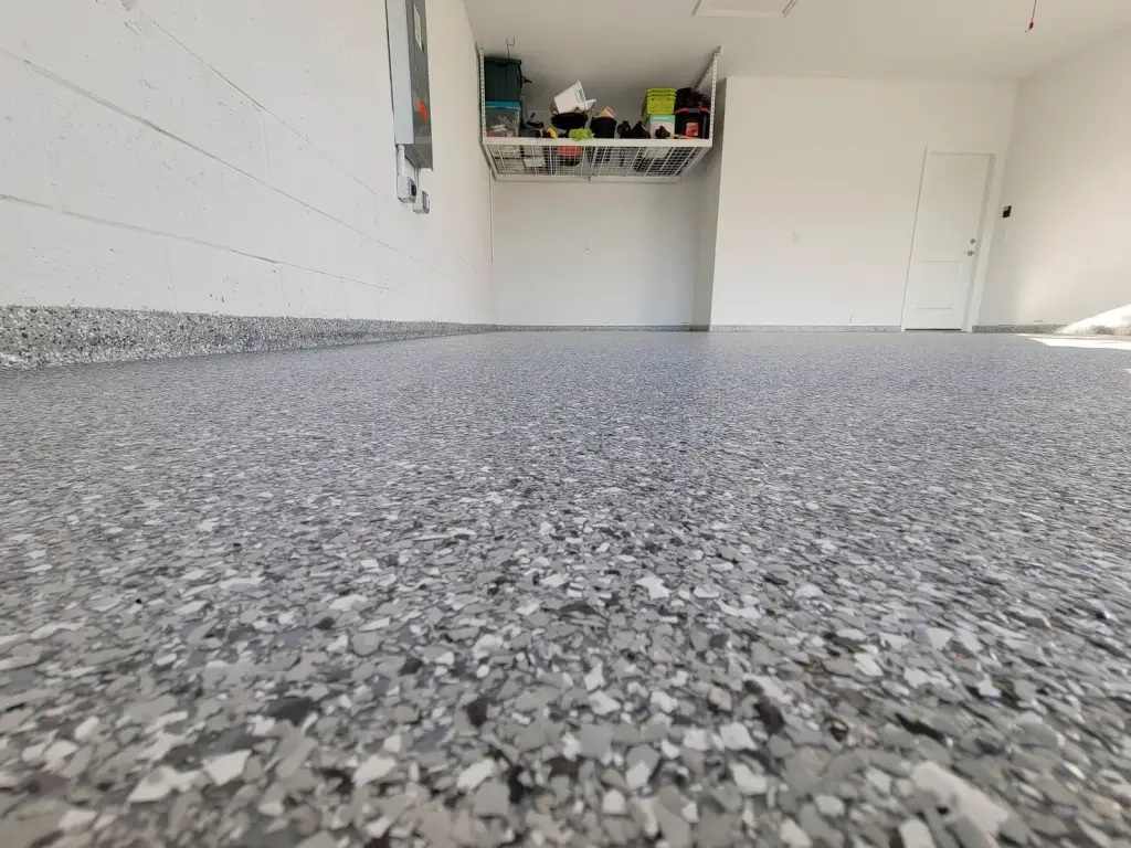 Wide view of a polished gray epoxy garage floor